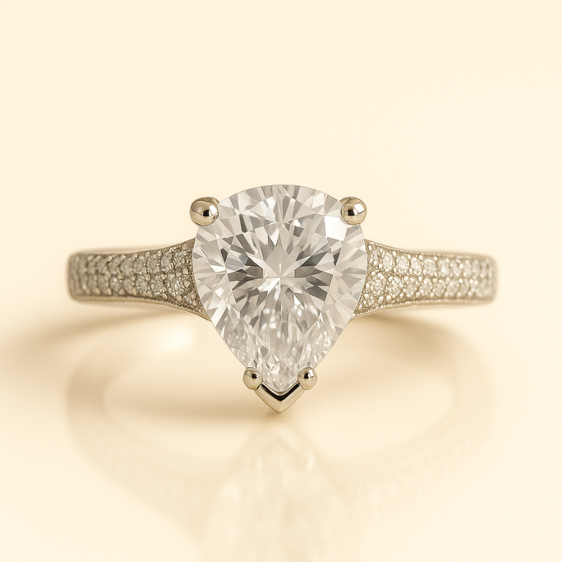 Rhodium pear cocktail ring with dazzling cubic zirconia stones by NueJewelz.