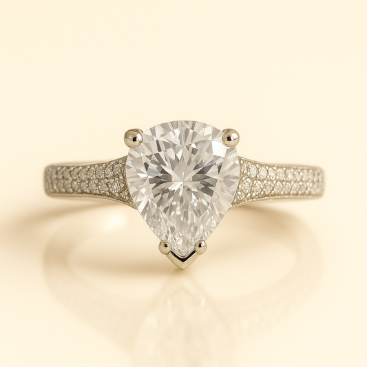 Rhodium pear cocktail ring with dazzling cubic zirconia stones by NueJewelz.