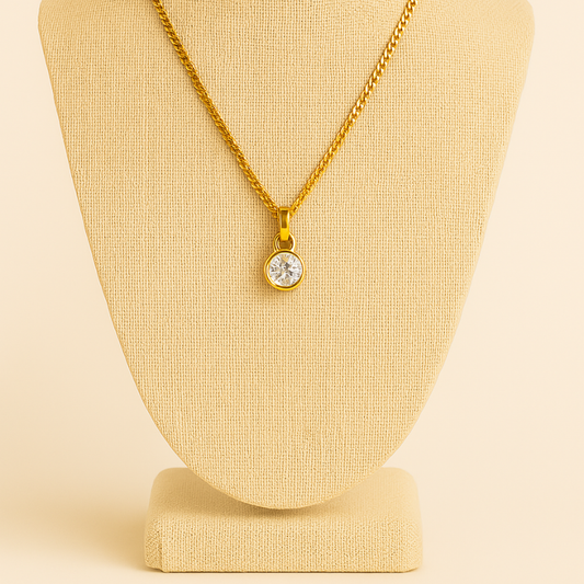 Elegant Oval Stainless Steel Pendant Necklace by NueJewelz with intricate sun design, suspended from an 18-inch chain.