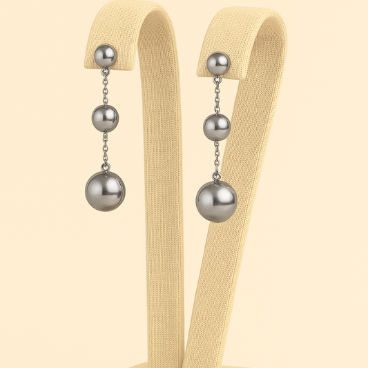 Elegant round stainless steel bead drop earrings by Nue Jewelz.