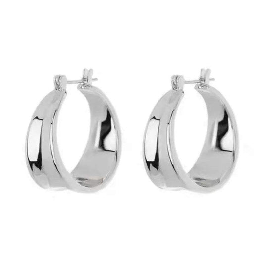 Stainless steel geometric hoop earrings with polished finish.