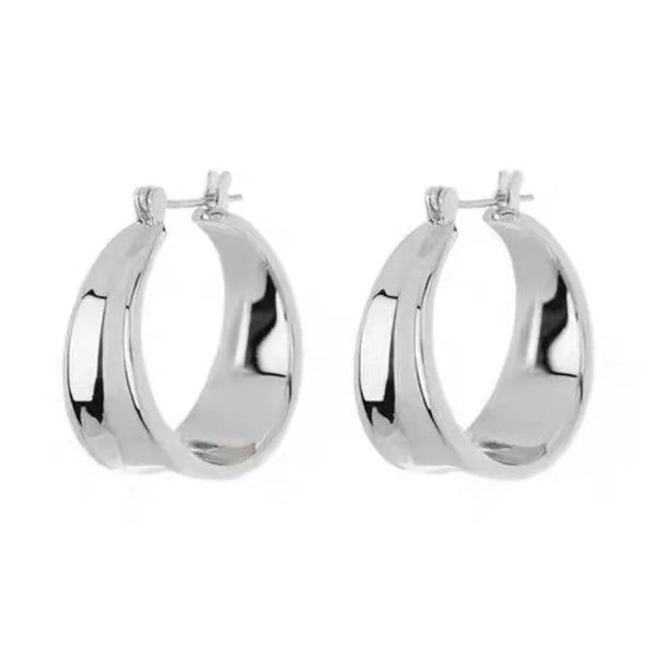 Silver geometric hoop earrings made from hypoallergenic, tarnish-resistant 201 stainless steel.