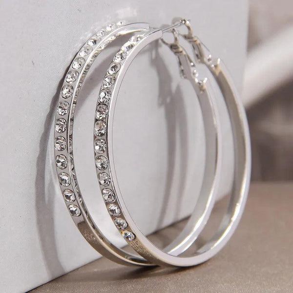 Stainless steel rhinestone hoop earrings from Nue Jewelz.