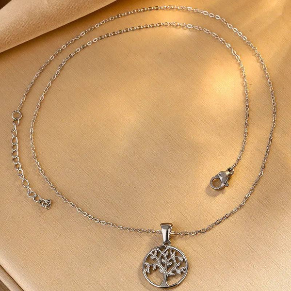 Elegant round tree of life necklace in 18K gold-plated stainless steel with delicate chain.