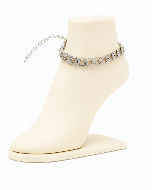 The Silver Link Glow silver-tone adjustable chain anklet and bracelet on display stand
