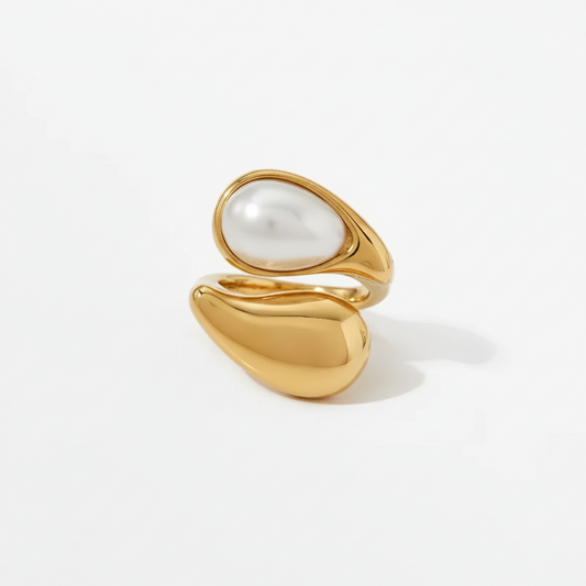 Gold-plated stainless steel dual-band ring with a luminous baroque pearl centerpiece