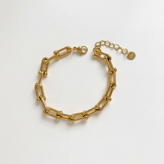 The Golden Link Bracelet with gold paperclip-style links and adjustable clasp