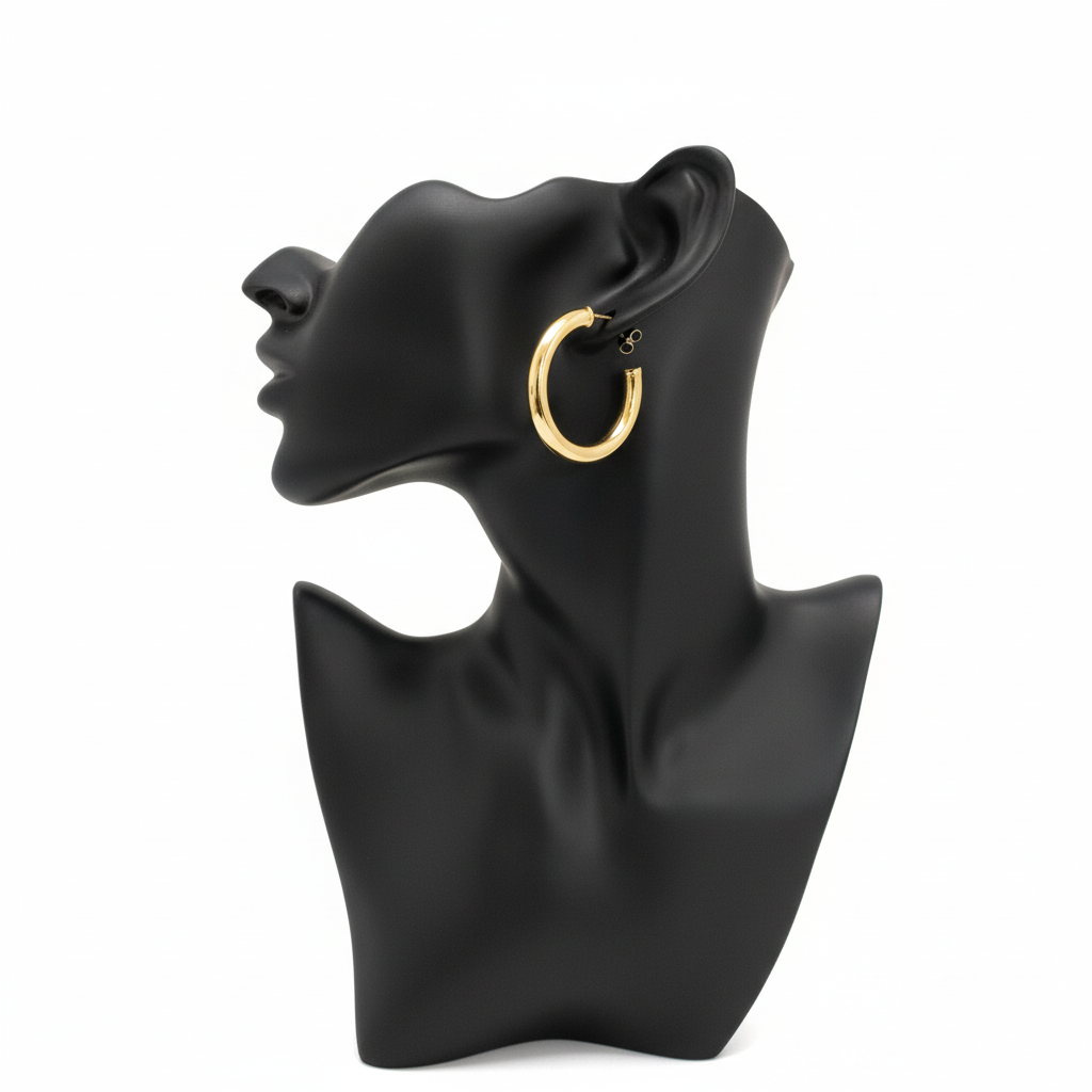 The Everyday Hoop gold chunky open hoop earrings on black mannequin bust