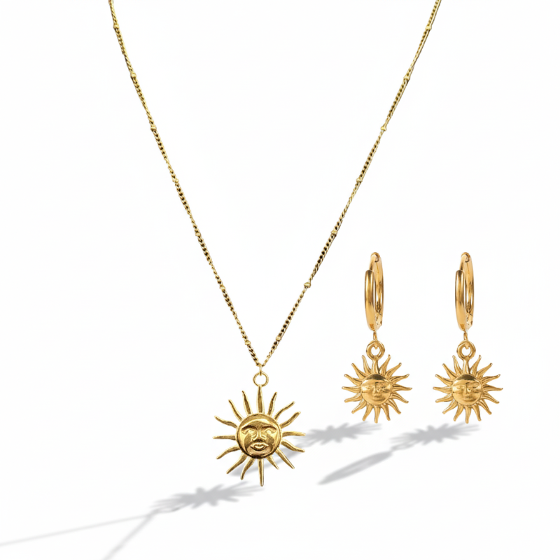 Radiant duo gold sun pendant necklace and drop earrings set with celestial sun face design