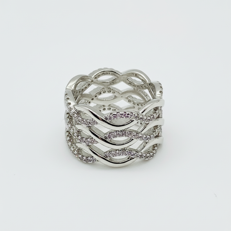 silver cocktail ring with multi-layered wave design and sparkling zircon stones