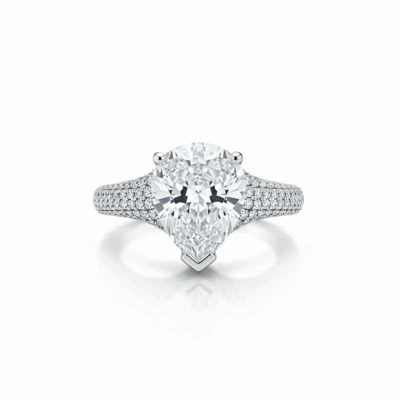 Rhodium pear cocktail ring with pear-cut cubic zirconia and pavé diamond band