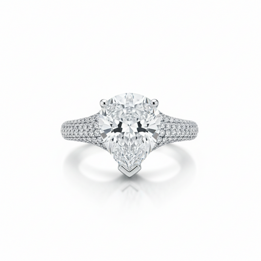 Rhodium pear cocktail ring with pear-cut cubic zirconia and pavé diamond band